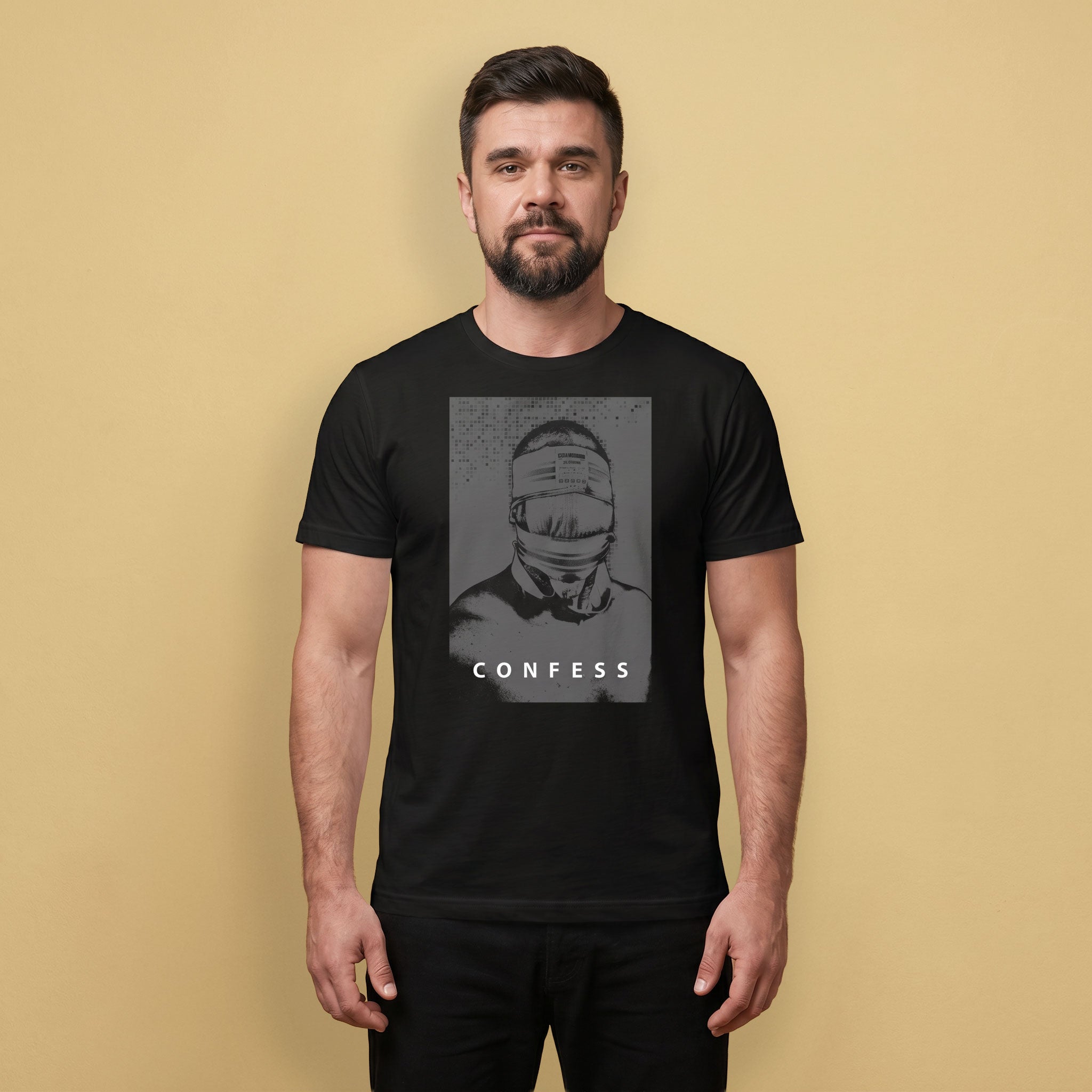 A gay man wearing a black t-shirt with a Blind Jock graphic design and 'CONFESS' text