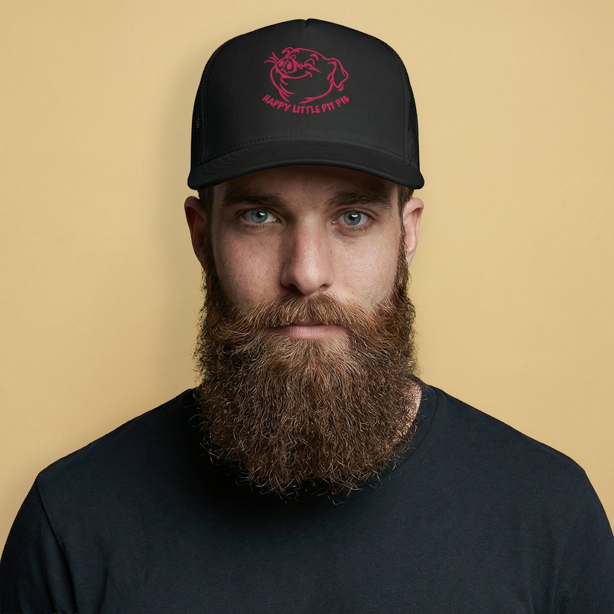 Gay Man wearing a Happy Little Pit Pig trucker cap with cartoon pig sniffing armpit graphic on black mesh snapback hat - Backroom Gear