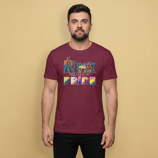 Gay man wearing a maroon t-shirt with a colorful "Kink Belongs at Pride" graphic and text on a beige background - Kink Belongs at Pride T-Shirt – Bold LGBTQ+ Kink Pride Tee – Gay pride shirts collection – LGBTQ+ pride t-shirts US UK – Made-to-order gay apparel