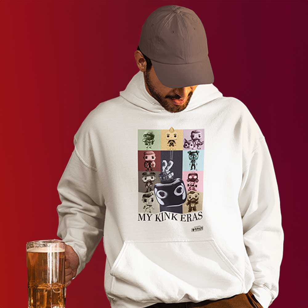 Gay man wearing a white hoodie featuring kinky pop vinyl graphic such as fisting and watersports as a tribute to Taylor Swift's Eras Tour Poster- White Kink Eras pullover - LGBTQ+ kink pride parody jumper by BackRoom Gear