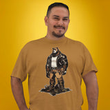 Gay bear wearing a toast brown t-shirt with a graphic of a buff cartoon bear wearing a leather jacket - Leather Daddy Bear T-Shirt – Gay Bear Pride Community Tee – LGBTQ+ pride t-shirts US UK – Gay pride shirts collection – Made-to-order gay apparel
