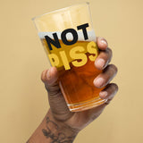 hand holding a half full NOT PISS pint glass - watersports kink pride LGBTQ+ glass by BackRoomGear
