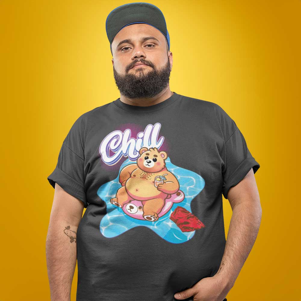 Gay bear wearing a asphalt grey t-shirt with a bear graphic and 'Chill' text on a yellow background - Bear Pool Pride T-Shirt | Chubby Bear Graphic Tee – Gay pride shirts collection – LGBTQ+ pride t-shirts US UK – Made-to-order gay apparel