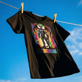 Black t-shirt with a colorful graphic and 'PRIDE MONTH' text hanging on a clothesline against a blue sky - black t-shirt with a colorful Demon Pride Month graphic design and text on a beige background - Pride Month DEMON T-Shirt Bold LGBTQ+ Pride Apparel – Gay pride shirts collection – LGBTQ+ pride t-shirts US UK – Made-to-order gay apparel