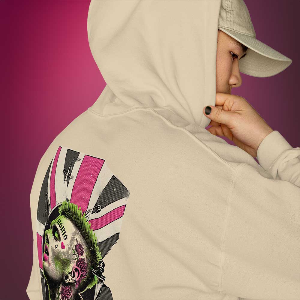 Gay Man wearing a beige hoodie with a unique homosexual pink & green punk design with the union jack on the back against a beige background - Queer Punk Anthem hoodie - gay rebel pride LGBTQ+ pullover by BackRoomGear