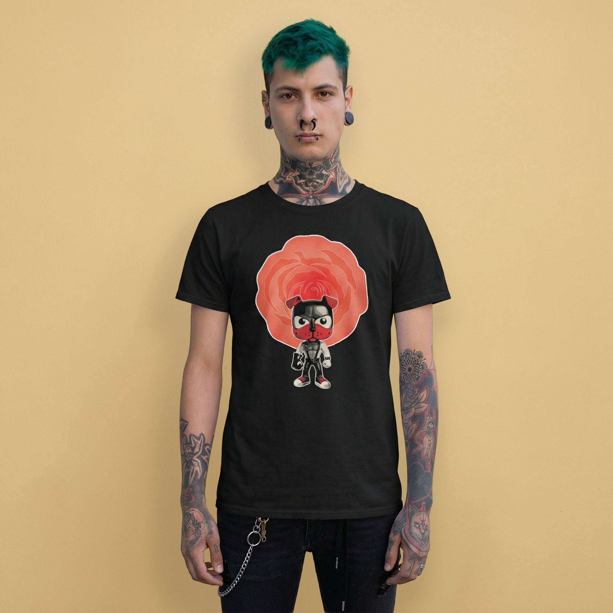 gay pup wearing a black t-shirt with a red rose and pup graphic on a beige background - pup play kink pride wear for US gay fisting community