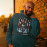 Gay bear wearing a indigo blue eaturing a hairy bear leather dom alpha with folded arms with the word "SIR" in blue in front of a brick wall. - Sir Bear leather dom hoodie - gay bear kink pullover by BackRoom Gear