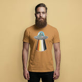 Gay Bear wearing a toast brown t-shirt with a Bear Pride flag UFO on a beige background - UFO Bear T-Shirt – Gay Leather Pride Tee for Bears – LGBTQ+ pride t-shirts US UK – Gay pride shirts collection – Made-to-order gay apparel
