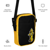 A black and yellow crossbody bag with a watersports hydrant design, featuring multiple pockets and an adjustable shoulder strap. Hydrant Party Essentials crossbody bag - gay pup circuit party bag by BackRoom Gear