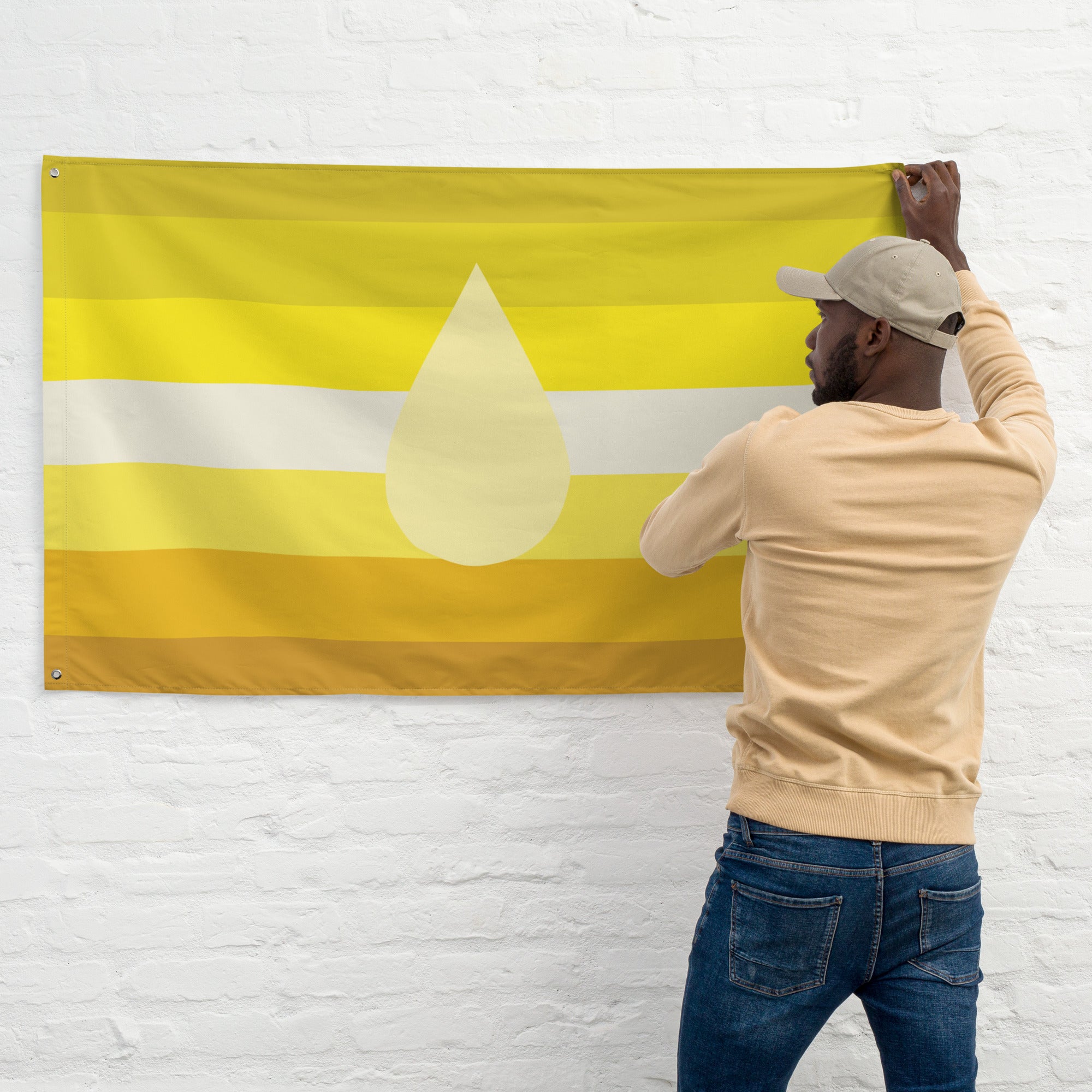 Piss Kink Pride Flag being hung by a man, showcasing vibrant yellow and white colors, representing kink pride flag.