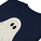 Folded navy blue t-shirt with a graphic of a ghost with a large penis. The shirt is designed for adults and features a playful, spooky Halloween theme- navy Well Hung Ghost Halloween shirt - spooky gay ghost tee by BackRoomGear
