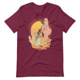 Maroon shirt featuring a sunset with two silhouetted figures, one sitting sucking the one standing, surrounded by cacti - Vintage Brokeback Cowboy t-shirt - western gay pride tee by BackRoom Gear