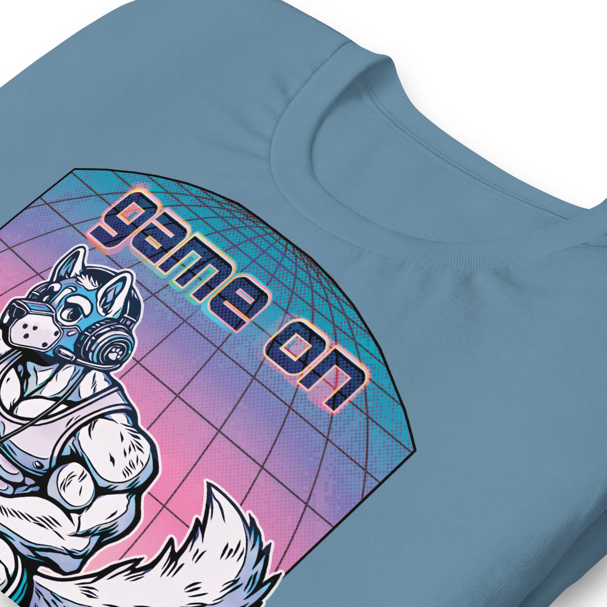 Folded steel blue t-shirt with a "Game On Pup" graphic design – Gamer Gay Pup Play T-Shirt – LGBTQ+ pride t-shirts US UK – Gay pride shirts collection – Made-to-order gay apparel