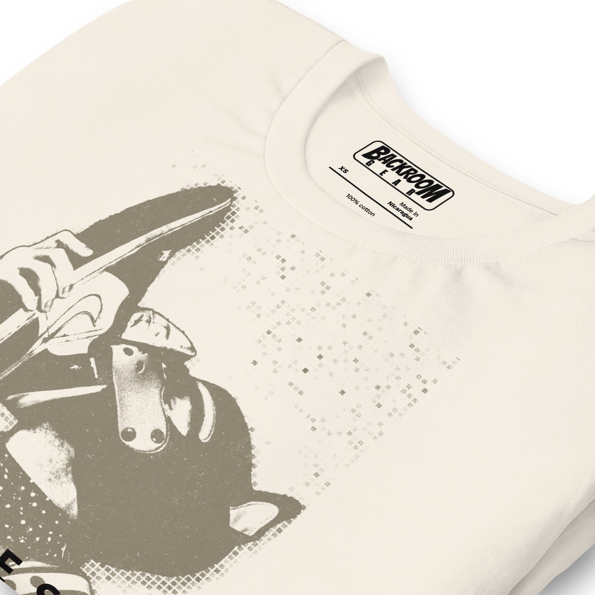 Folded closeup of vintage white t-shirt with a Sneaker Pup graphic design and 'CONFESS' text