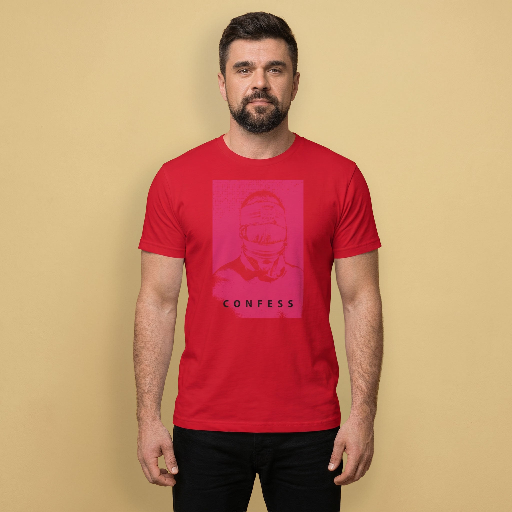 A gay man wearing a red t-shirt with a Blind Jock graphic design and 'CONFESS' text