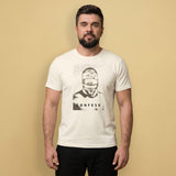 A gay man wearing a vintage white t-shirt with a Blind Jock graphic design and 'CONFESS' text