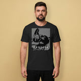 A gay man wearing a black t-shirt with a Sneaker Pup graphic design and 'CONFESS' text
