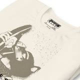 Folded closeup of vintage white t-shirt with a Sneaker Pup graphic design and 'CONFESS' text